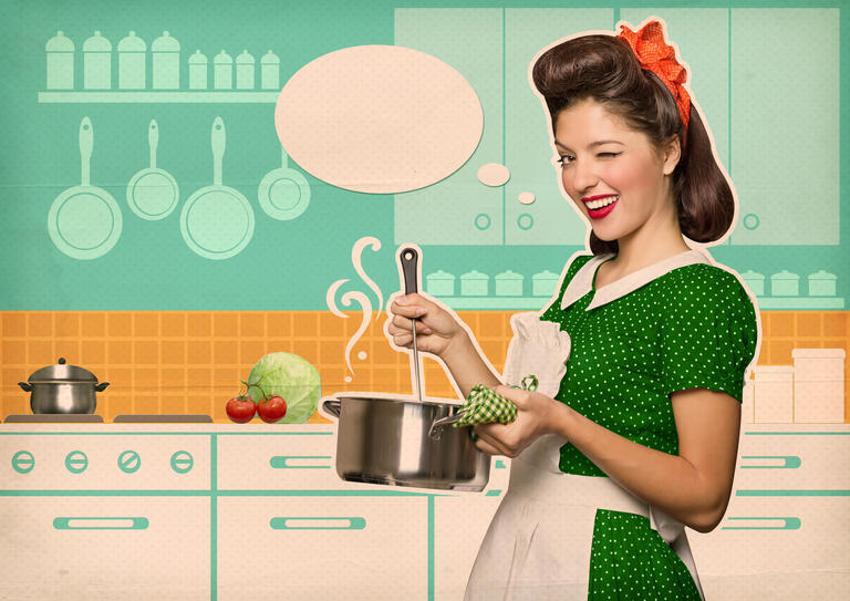 A 1950s housewife winks at the camera while stirring a pot and standing against the background of a cartoon-drawn kitchen