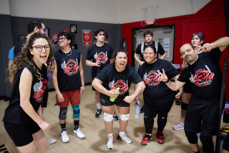 UNLV Corporate Challenge volleyball team doing fun poses