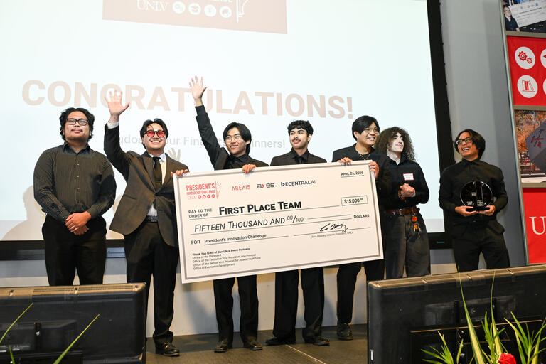 winning team holds check