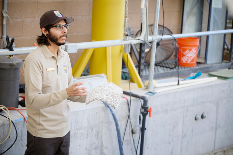 Danny Villanueva talks with students visiting Ash Meadows
