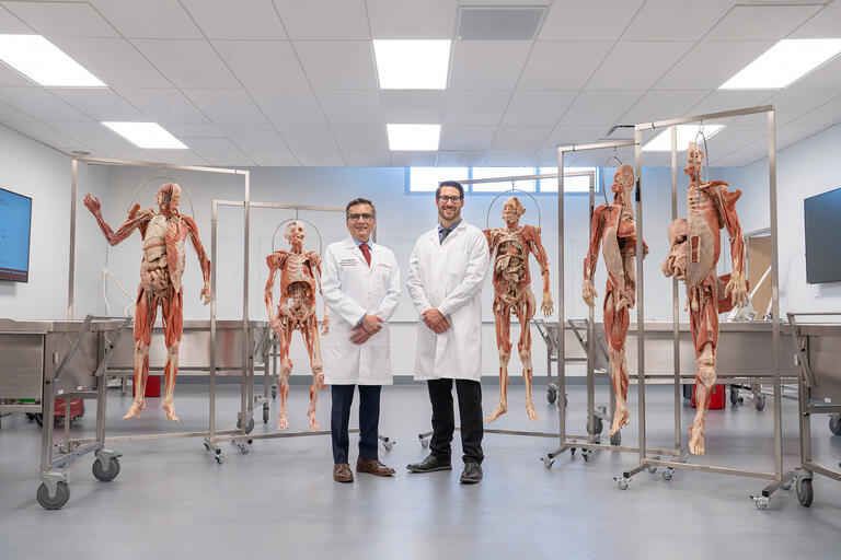 Dr. Aftab Merchant and Owen McCloskey in the school of medicine's prosection lab.