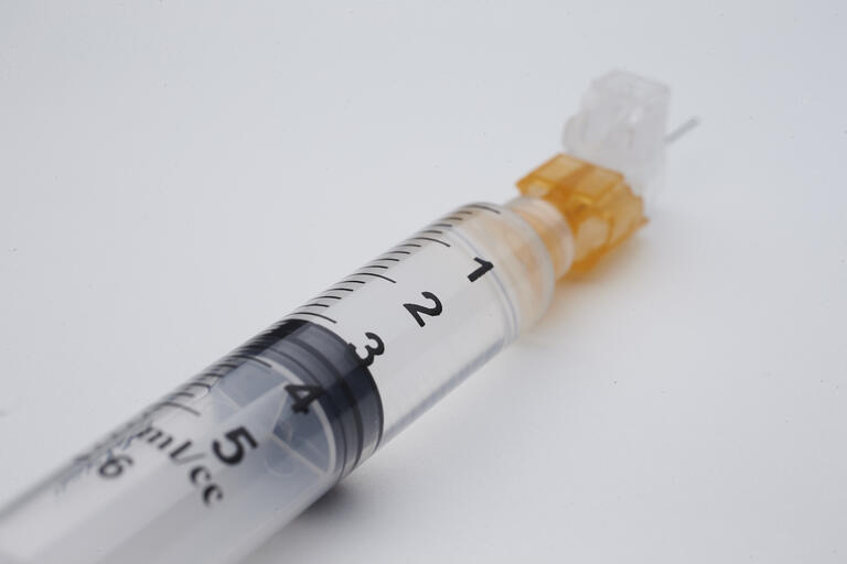 syringe on white background