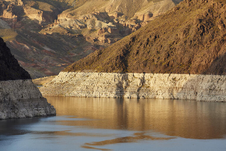 An image of Lake Mead and mountains in the background