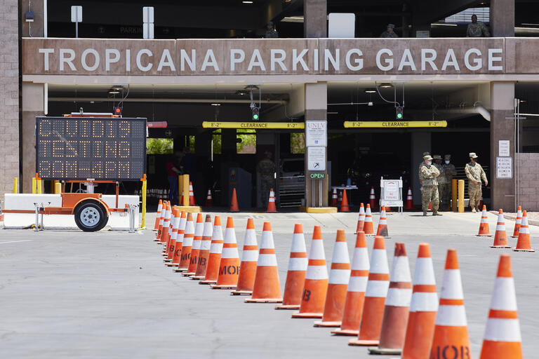 Cones lined up in front of parking garage entrance