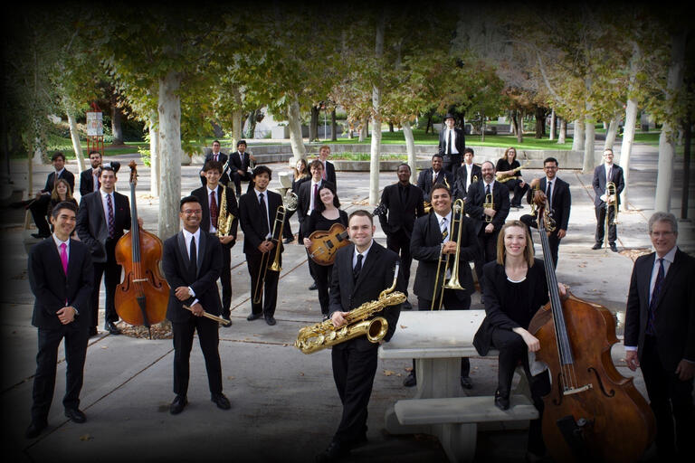 Several members of the UNLV Jazz Ensemble pose with their instruments.