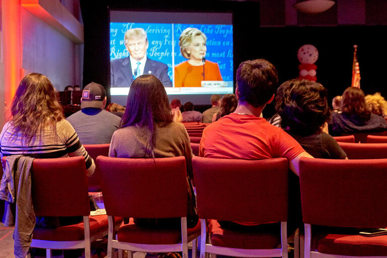 Students watch the first presidential debate in the Student Union