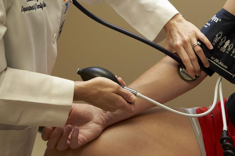 Closeup of patient receiving a blood pressure test