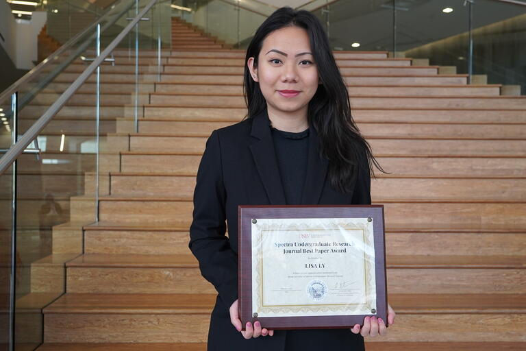 Lisa Ly Holding Certificate Plaque