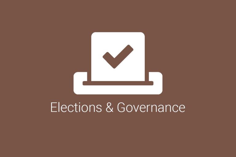 image of ballot box; elections and governance