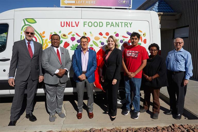 UNLV and Three Square representatives standing outside the new UNLV Food Pantry van