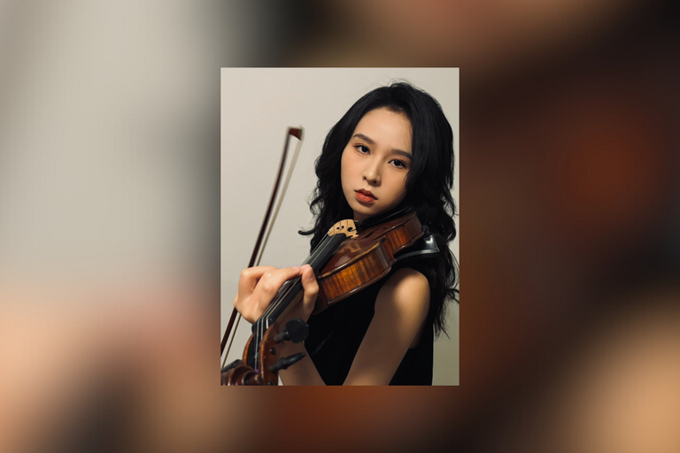 Asian woman playing the violin