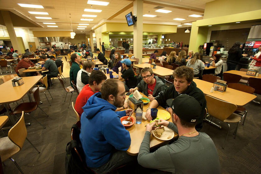 students eat at tables