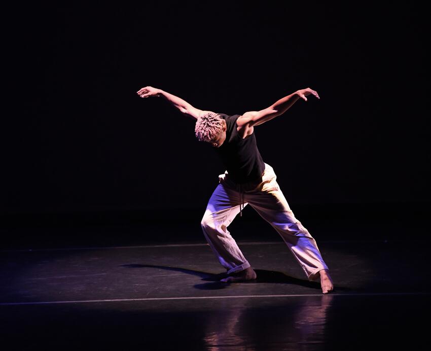 UNLV dance student performing on stage.