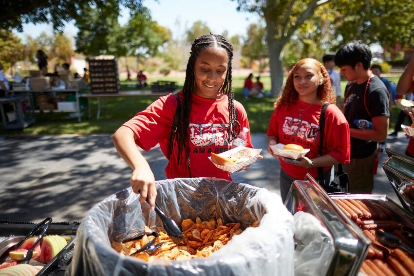 Students eating at a barbecue