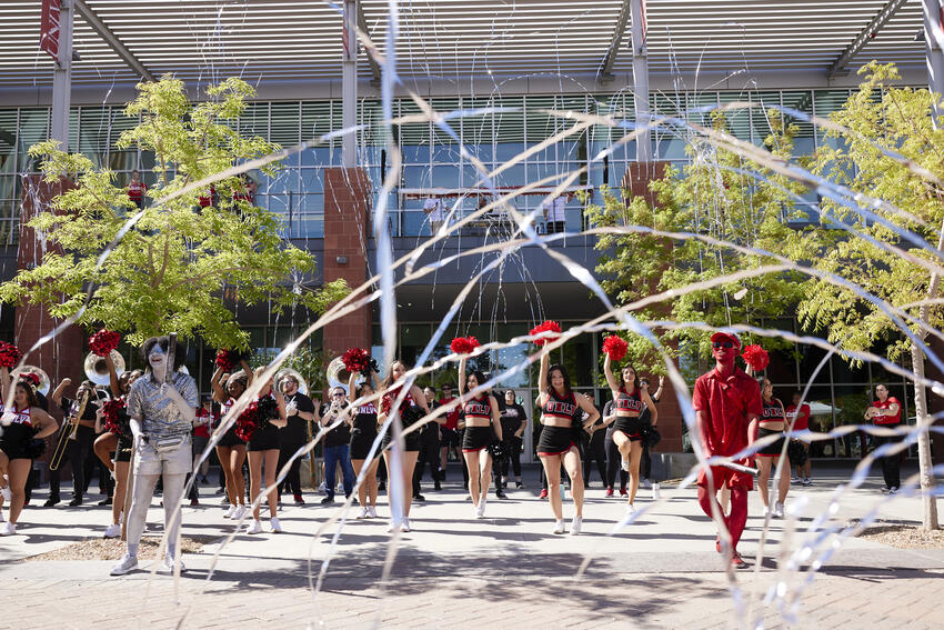 UNLV cheerleaders performing on Pida Plaza