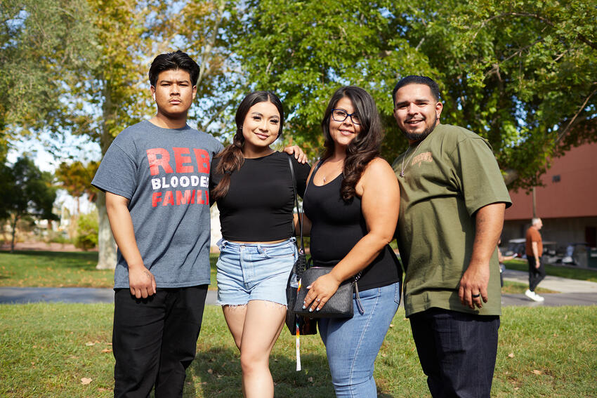 A family of four posing for a picture during Family Send Off