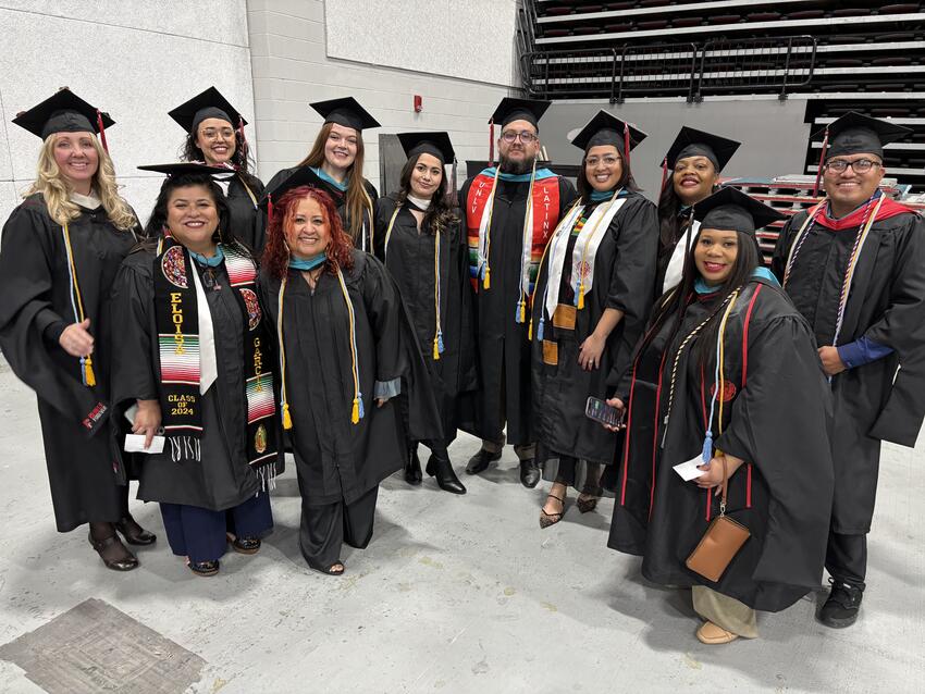 A group of graduates in caps and gowns