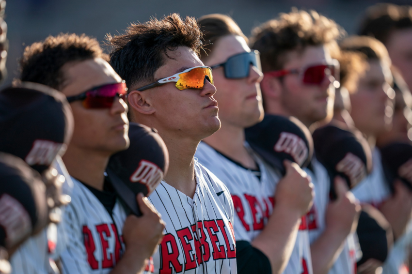 UNLV baseball players lined up for the national anthem.