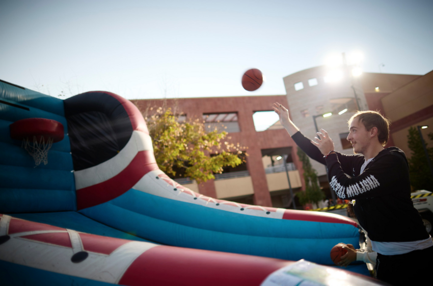 A student playing basketball