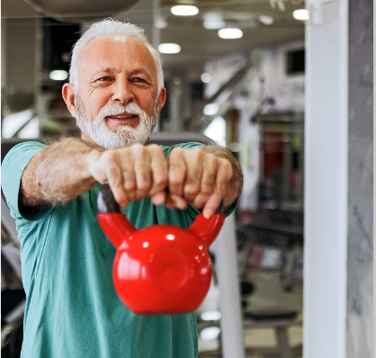A man using a kettlebell