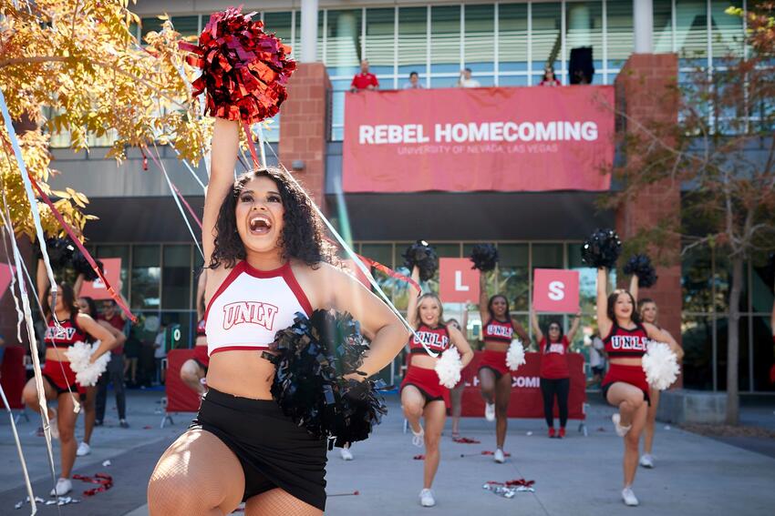 Cheerleaders performing during the Rebel Homecoming kickoff event