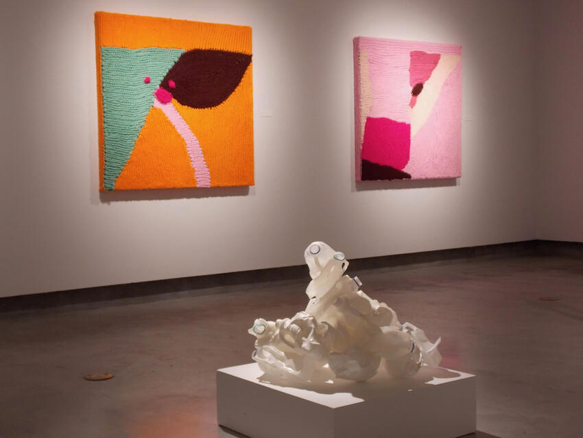 Photo of abstract art pieces displayed in the gallery