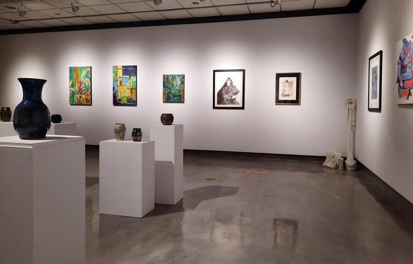 Various art pieces in a gallery.
