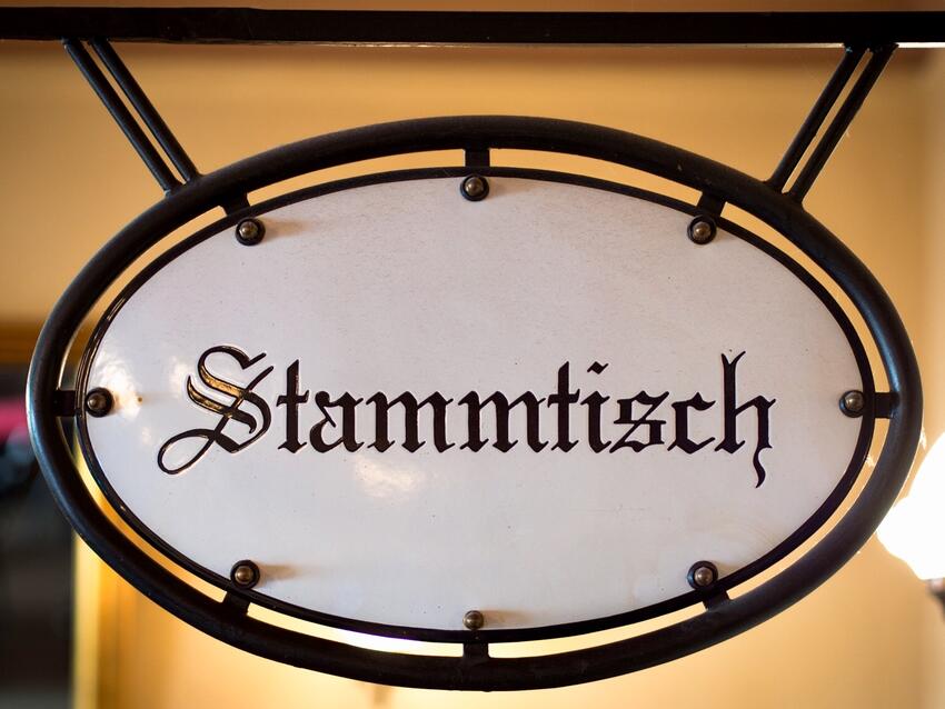 A sign that says: Stammtisch