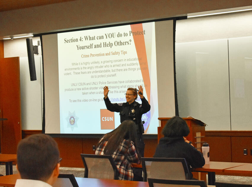 UNLV Police Officer presenting in front of a class