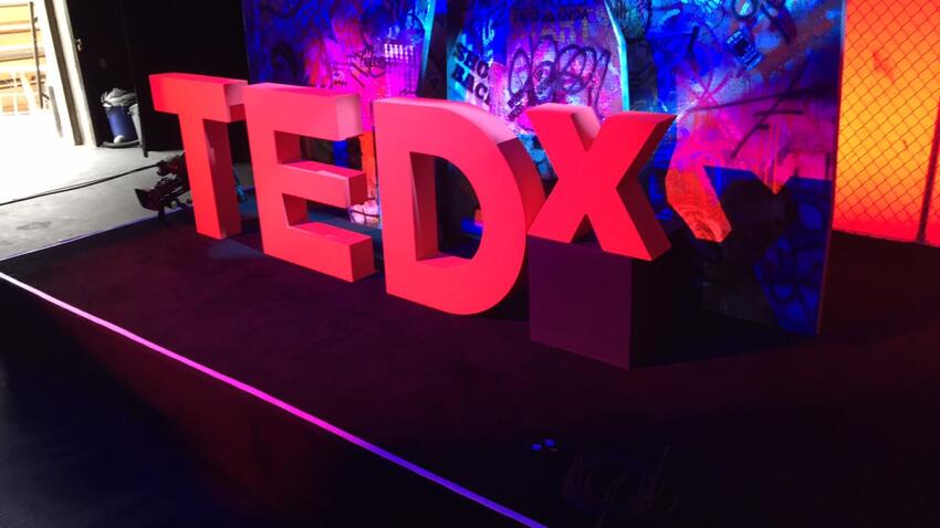 TEDx block letters in red