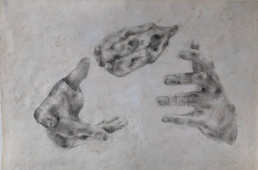 An art piece featuring three hands.