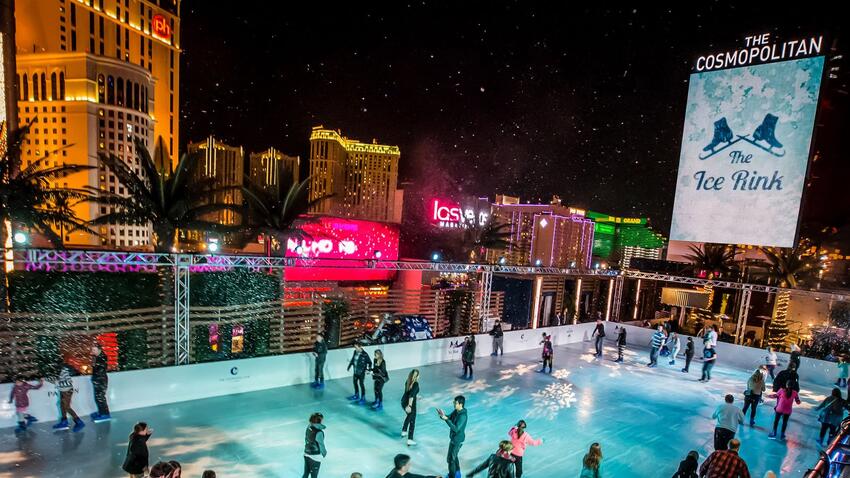 People skating on an ice rink.