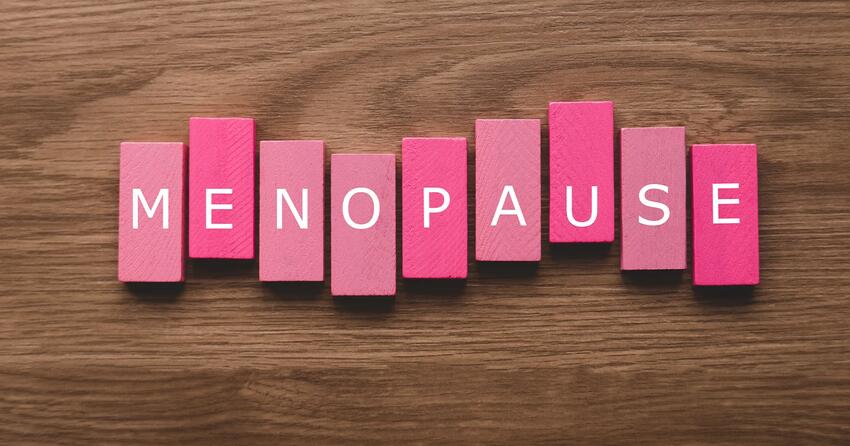 Text tiles spelling out "menopause"