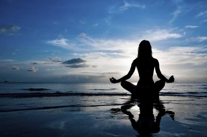 Woman doing yoga outside