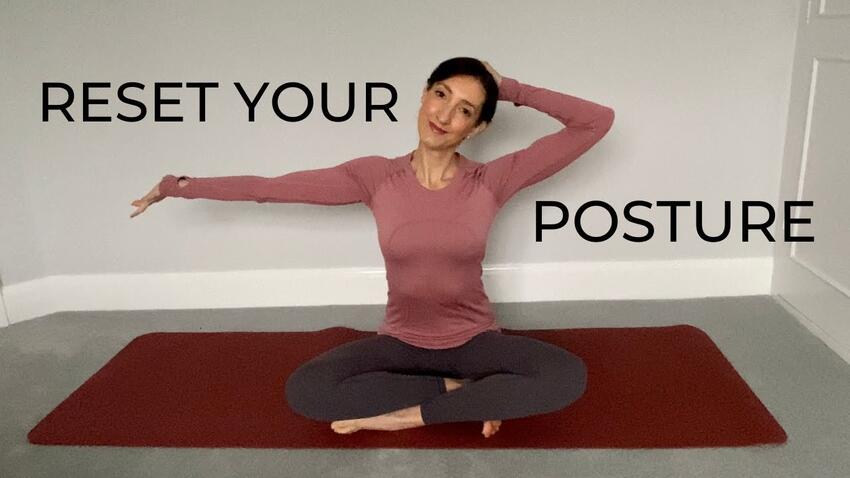 Reset your posture. A woman stretching on a yoga mat.