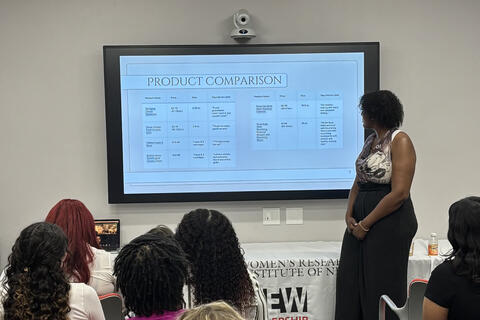 A person presenting on product comparison
