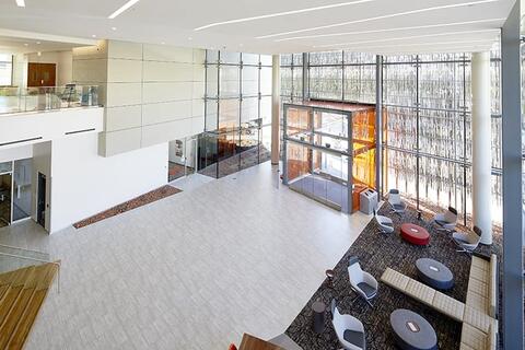 Large, open lobby that lets in a lot of natural light